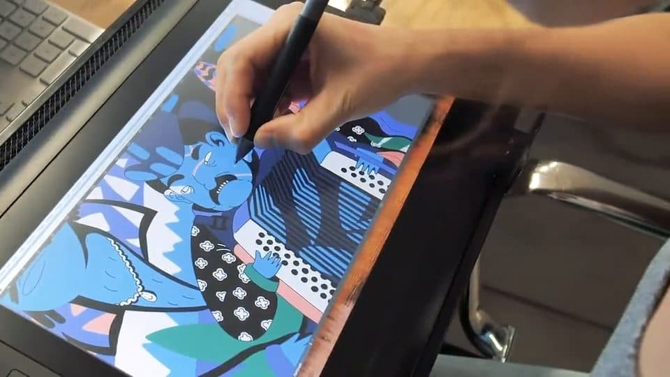 A designer drawing on a pen display